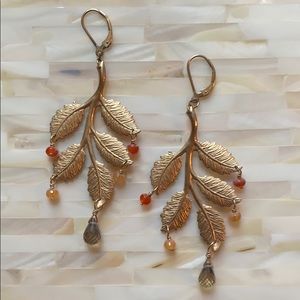 Gold leaf with drop stone earrings.